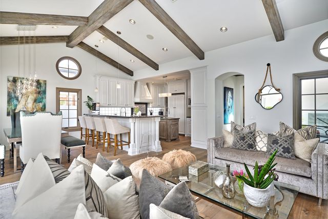 Living room with sofa and beamed ceiling