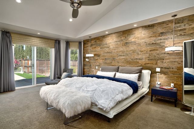 Bedroom with reclaimed-wood accent wall
