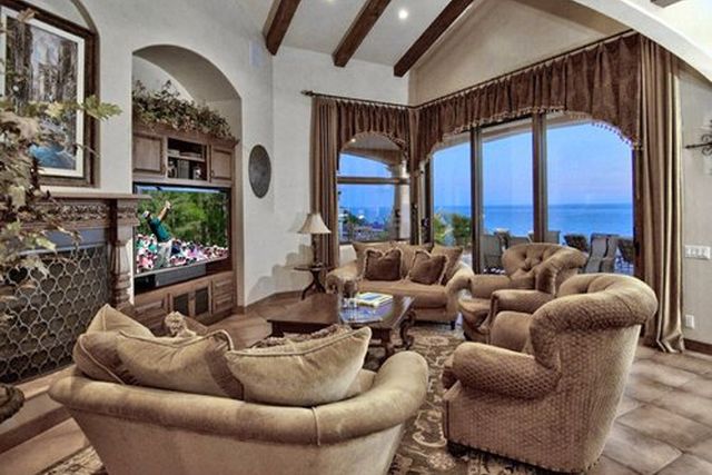 Living room with sofas and ocean-view windows